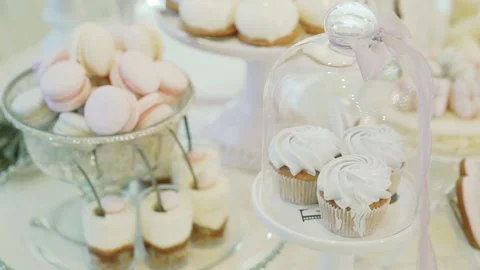 Candy bar wedding. bright buffet with many sweet snacks. Move camera Stock Footage 136212644