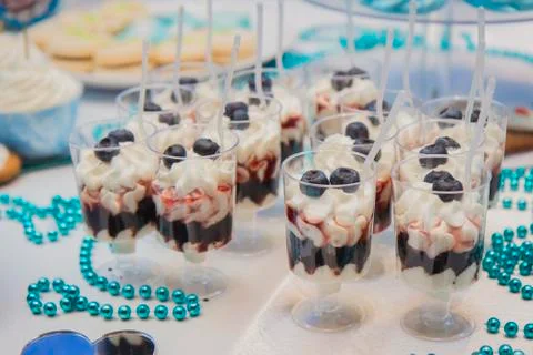 Candy bar on wedding ceremony with different candies Stock Photos