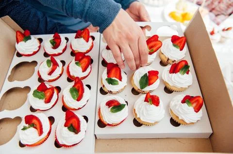Candy bar. Wedding table with sweets, cupcakes Stock Photos