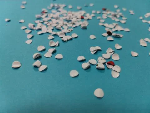 Candy on blue paper Stock Photos