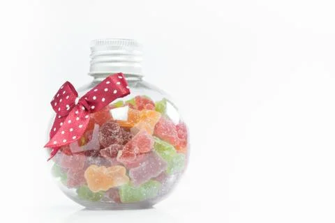 Candy in a bottle on a white background 写真素材