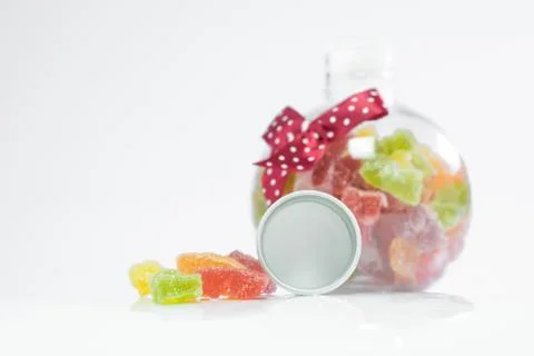 Candy in a bottle on a white background Stock Photos
