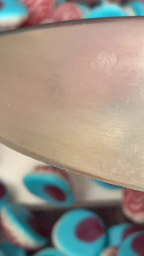 Candy brain scoop Banner with moving jelly candies in shape of skull, eye, jaw Stock Footage 316078833