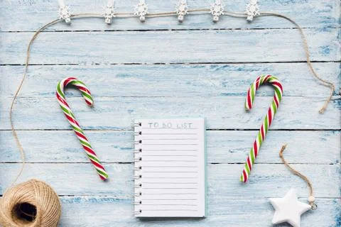 Candy cane and to do list on a blue and white background Stock Photos