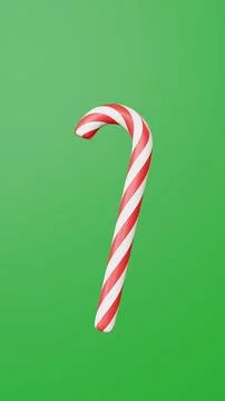 Candy cane on green background Stock Illustration