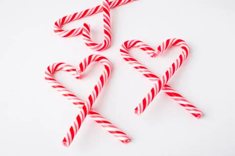 Candy cane heart on white Stock Photos