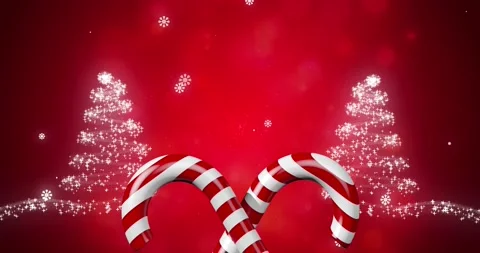Candy cane icon over shooting star forming a two christmas trees against red Stock Footage 162891089