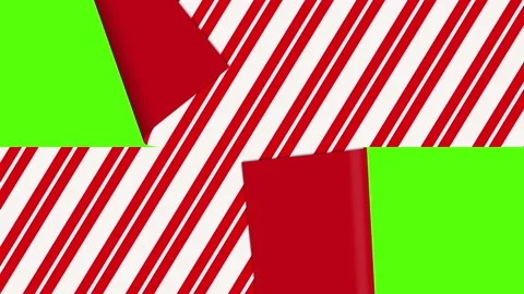 Candy cane patterned Christmas wrapping paper transition Stock Footage 219551192