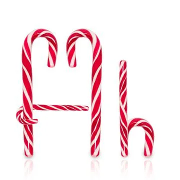 Candy cane in shape of letter H isolated on white background. Stock Photos