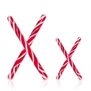 Candy cane in shape of letter X isolated on white background. Stock Photos