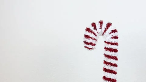 Candy cane on a white background, realistic Christmas decor Stock Footage 285197627