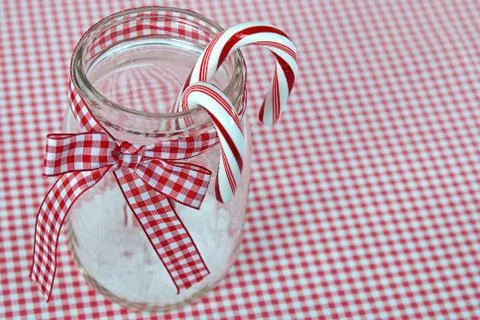 Candy canes in canning jar Stock Photos