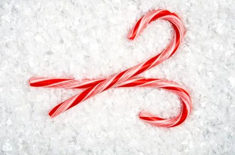 Candy canes in snow Foto stock