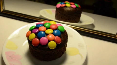 Candy on chocolate muffin Stock Footage 36815836