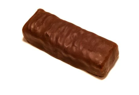 Candy. Chocolate nut candy isolate on a white background close-up. Stock Photos