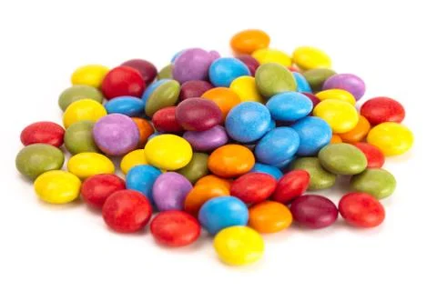 Candy Coated Multicolored Chocolates  on a White Background Stock Photos