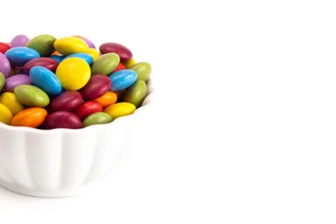 Candy Coated Multicolored Chocolates  on a White Background Stock Photos
