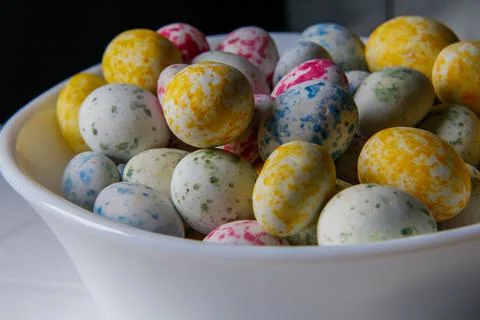 Candy colored quail eggs. Close-up Stock Photos