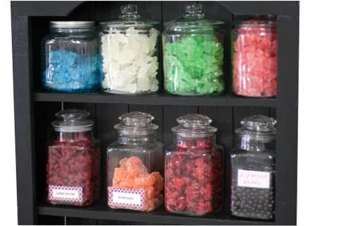 Candy in container on store shelf Stock Photos