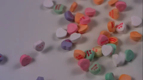 Candy Conversation Hearts Fall On White Background In Slow Motion Stock Footage 59673211