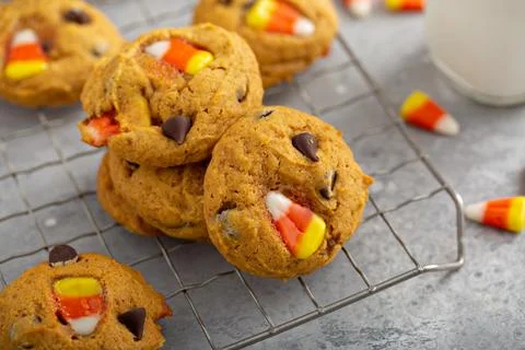 Candy corn and chocolate chips pumpkin cookies Stock Photos