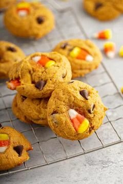 Candy corn and chocolate pumpkin cookies Stock Photos