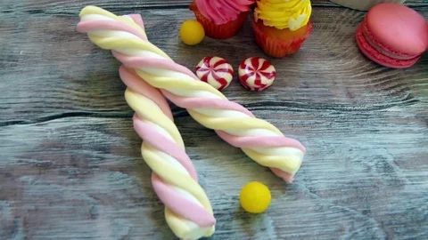 Candy, cupcakes and macaroons Vídeo Stock 71796459