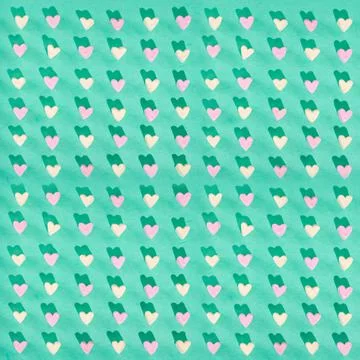 Candy of different colors on a turquoise background, a heart texture on Valen Stock Photos