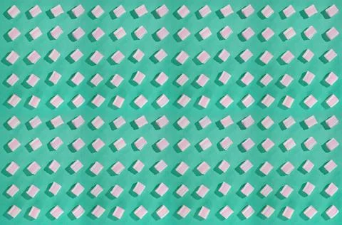 Candy of different colors on a turquoise background, texture Stock Photos