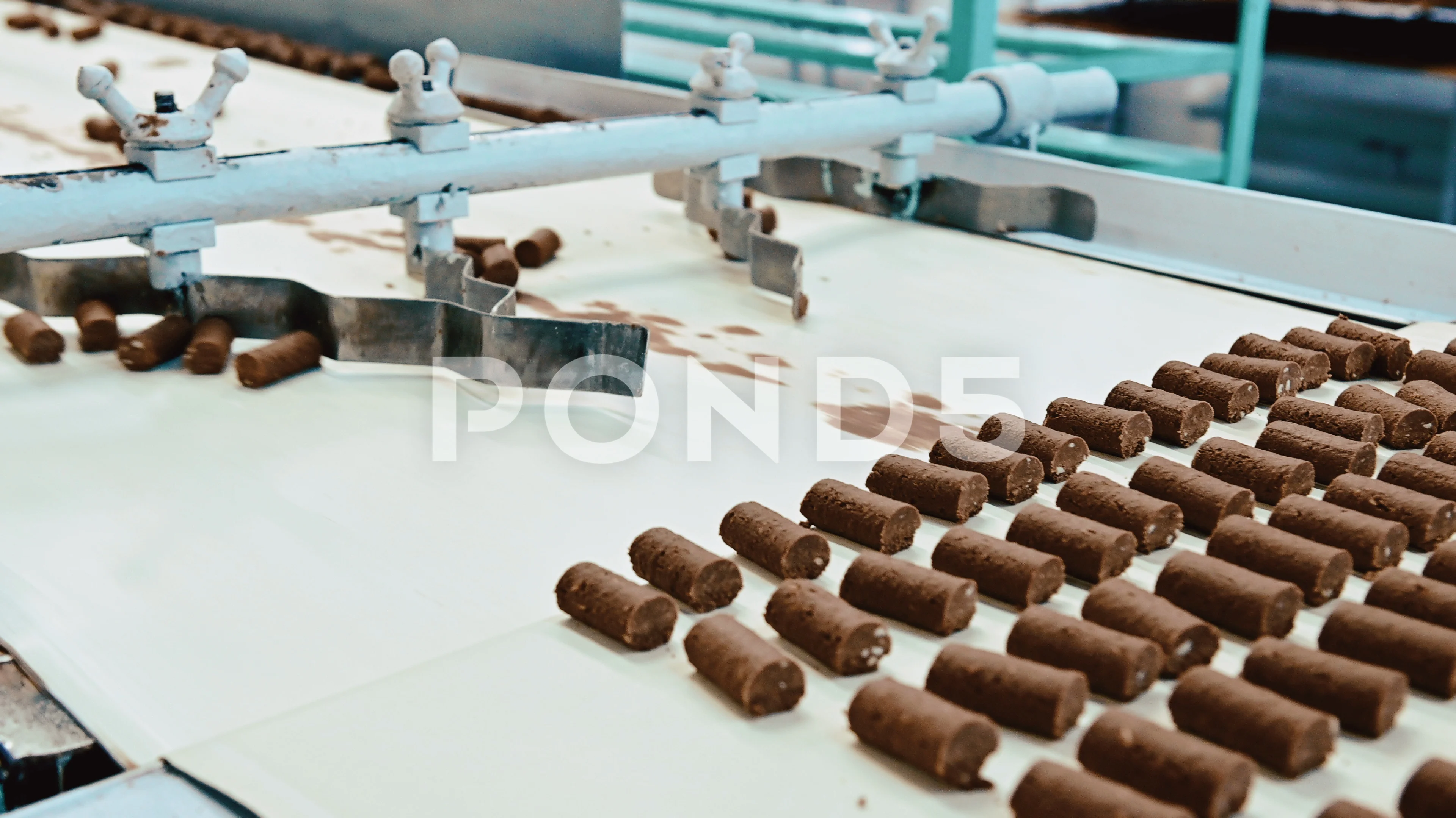 https://images.pond5.com/candy-factory-chocolate-process-making-footage-107075429_prevstill.jpeg