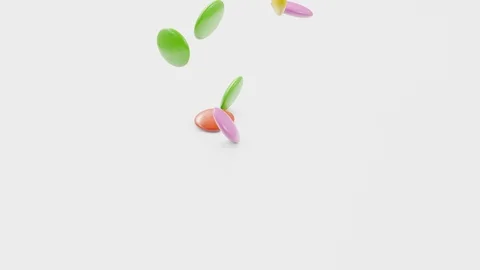 Candy falling on to table in slow motion Stock-Footage 120328719