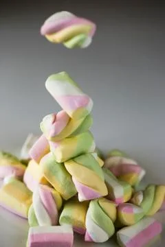 Candy falls on the table. Stock Photos