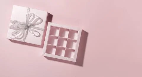 Candy gift box empty pink background. Template advertising chocolate sweets Stock Photos
