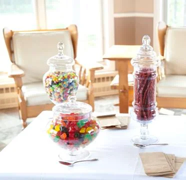 Candy in glass jars Stock Photos