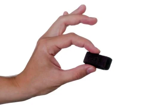 Candy in hand Stock Photos