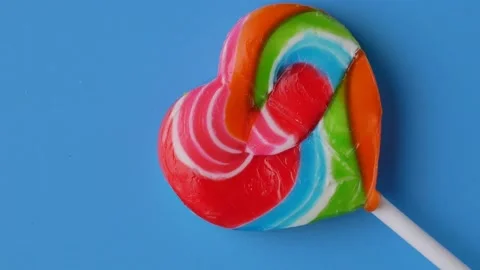 Candy heart rotation close up top view zoom in Stock Footage 212920702