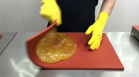 Candy maker making lollipops in confectionery in 4K UHD video. Stock Footage 63632458