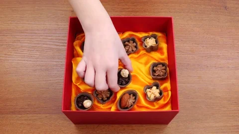 Candy of milk and dark chocolate with various nuts Stock Footage 72247207