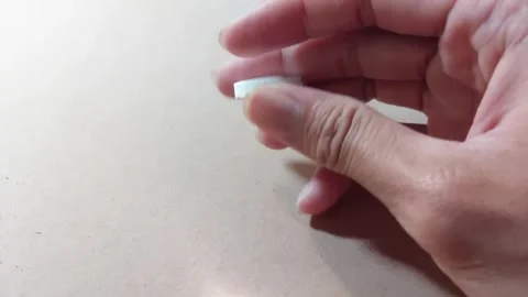 A candy with a mint flavor branded Davos Stock Footage 242558944