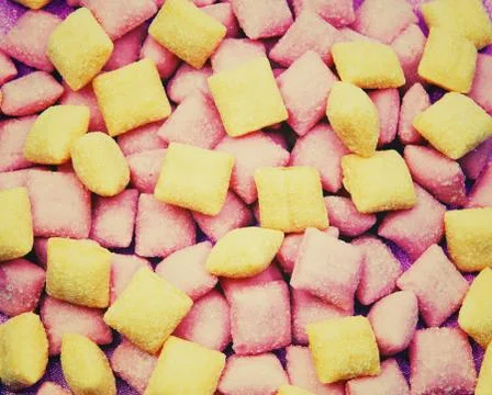 Candy mix pads background with light, concept of sweet life Stock Photos