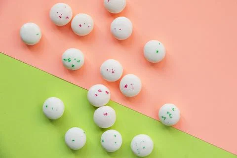 Candy on the pink and green background Stock Photos