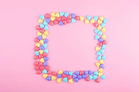 Candy on pink background Stock Photos