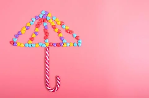 Candy on pink background Stock Photos