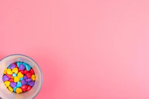 Candy on pink background Stock Photos