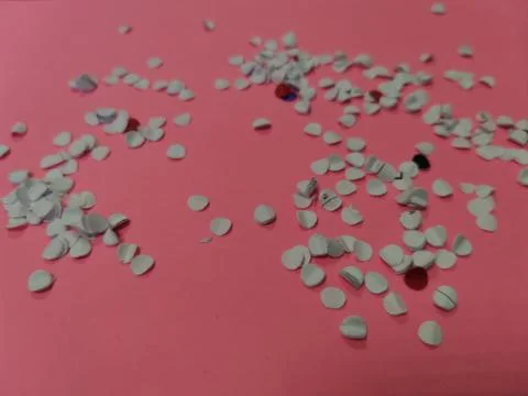 Candy on pink paper 스톡 사진