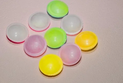 Candy on pink textured background. Stock Photos