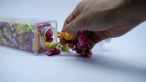 Candy placed in a bottle Stock Footage 221134582