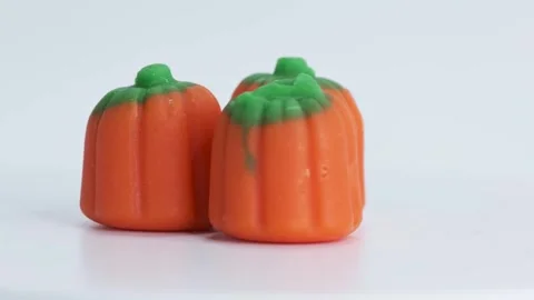 Candy Pumpkins three rotating LtoR Stock Footage 316798069