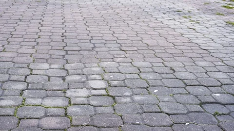 Candy rolls on the sidewalk . The child dropped the candy Stock Footage 104701639