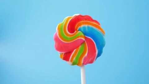 Candy rotation blue background Stock Footage 212921189
